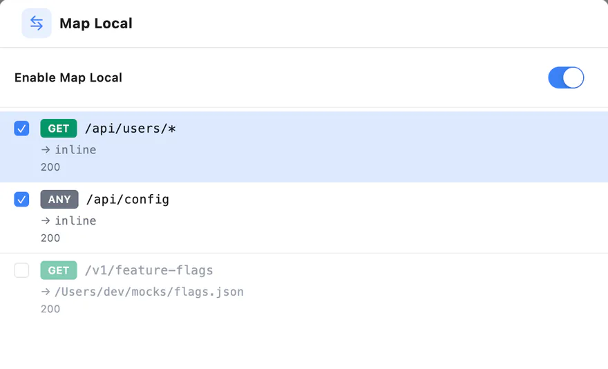 Map Local rules answering /api/users/* and /api/config with inline bodies